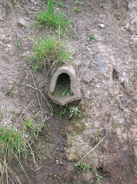 drain used to increase agricultural yeilds in wet
                soil