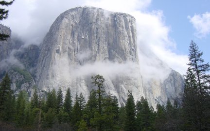 half dome mountain with
            mist