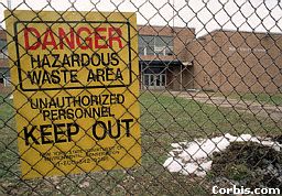hazardous chemicals sign in front of a school